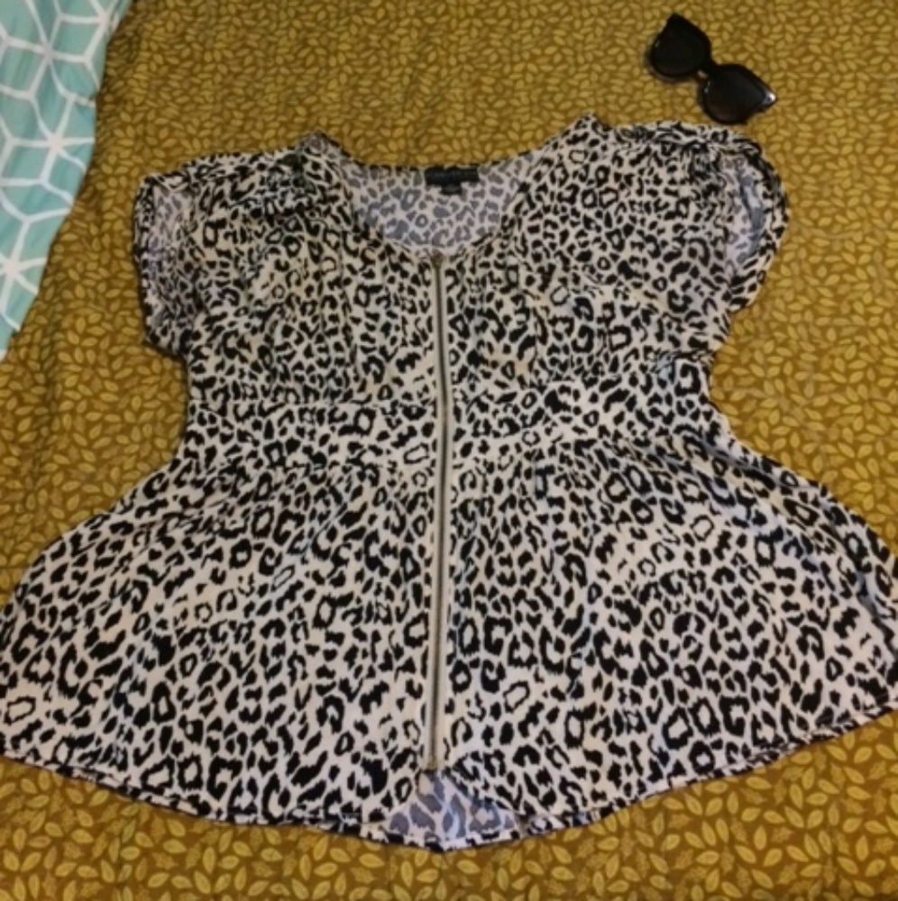 Animal print peplum top with zipper
